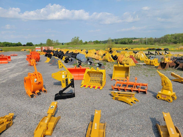 Excavator attachments displayed for sale and rental to help contractors choose the best equipment option.