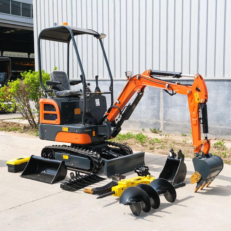 Mini excavator equipped with buckets, hydraulic thumb, auger, and breaker for landscaping, utility work, and site preparation.